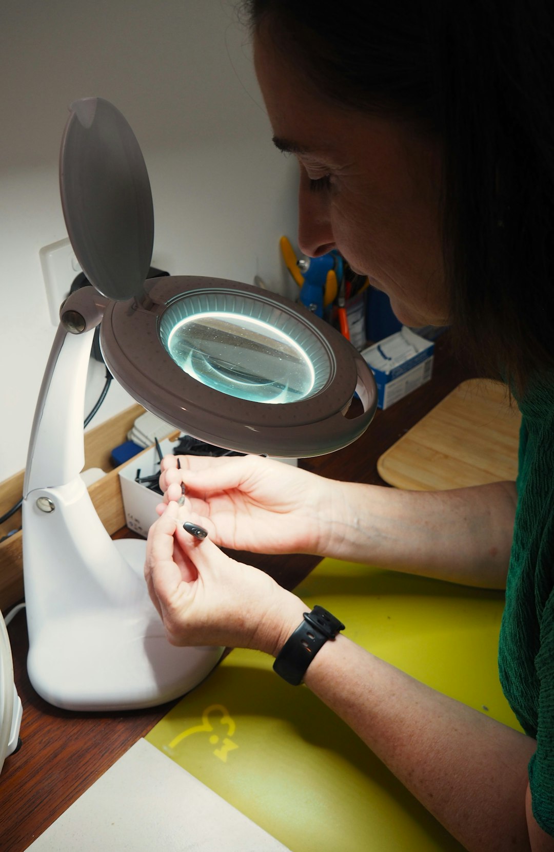 The Art of Drawing Readers In: Your attractive post title goes here repairing a hearing aid, a small repair laboratory